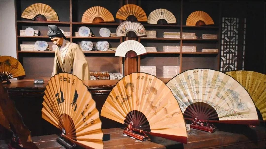 Folded Chinese fans with decorative tassels